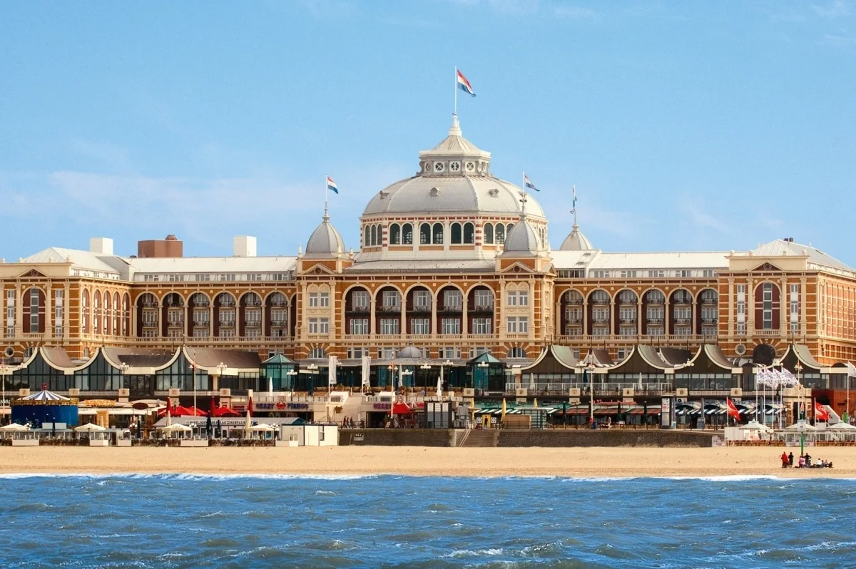 Grand Hotel Amrâth Kurhaus Scheveningen seen from the North Sea, with the beach and historic facade