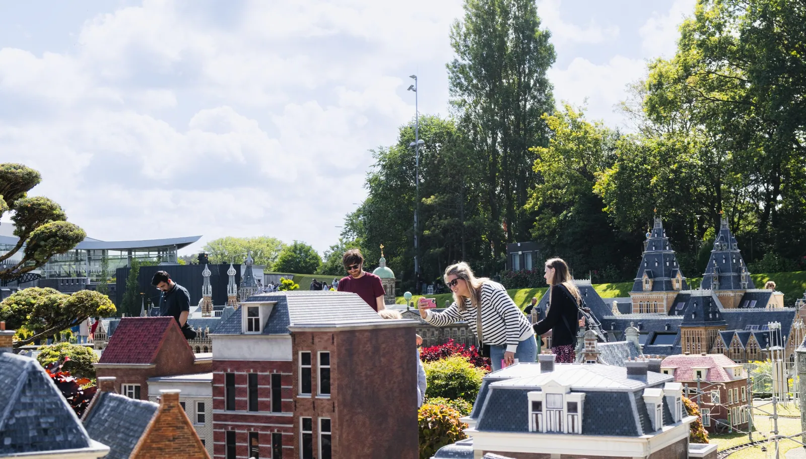 Visitors including wheelchair users among the miniature Dutch landmarks