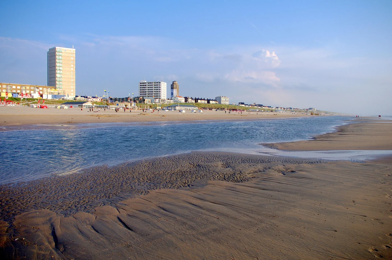 Wide sandy beach and seafront buildings in Zandvoort